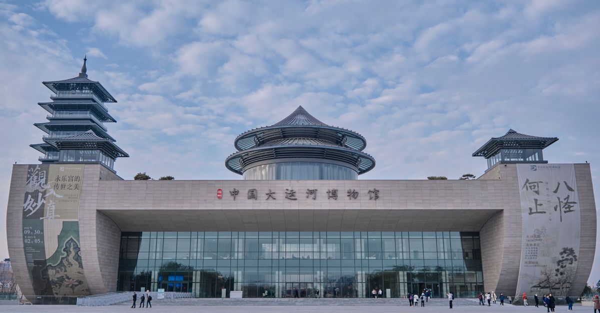 Front view of the modern Grand Canal Museum in Yangzhou, China, showcasing Chinese architecture.